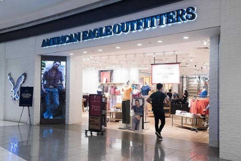 Staff at American Eagle Outfitters' Suntec City outlet (above), which is having a closing-down sale, confirmed that it will close on Feb 28. Its VivoCity flagship store ended operations on Wednesday, staff said.
