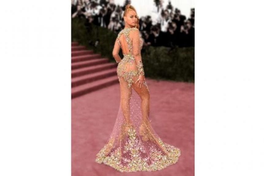 Other celebrities who have made headlines with their outfits include R&B queen Beyonce (above) in Givenchy in 2015, singer-actress Jennifer Lopez in Versace in 2000 and actress Angelina Jolie in Versace in 2012.