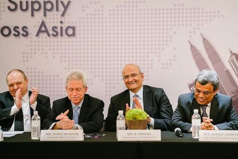 (From left) Pan Asia Logistics founder Christian Bischoff, TVS Asianics chief executive James McAdam, TVS Logistics Services managing director R. Dinesh and India's High Commissioner to Singapore Jawed Ashraf at a media conference. TVS Asianics said 