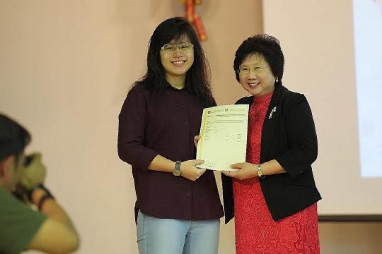 Millennia Institute student Gwen Tan had to repeat her first school year, but she resolved to be more diligent and managed to score two As, a vast improvement from the failing grades she got in her first promotional exam four years ago. She plans to 