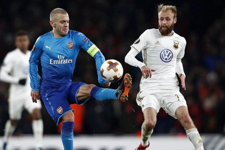 Arsenal may turn to Jack Wilshere, seen in action against Ostersunds' Curtis Edwards during Thursday's Europa League second leg, to anchor the midfield against Manchester City.