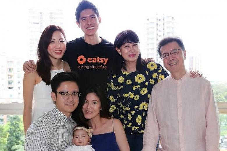 Mr Shaun Heng (in black shirt) with (from left) his girlfriend Lim Kai Chian, brother-in-law Ng Hong Kin, niece Alexa, sister Charmaine Heng, mother Jane Heng and father Paul Heng. Mr Shaun Heng said his parents always taught the family to give back 