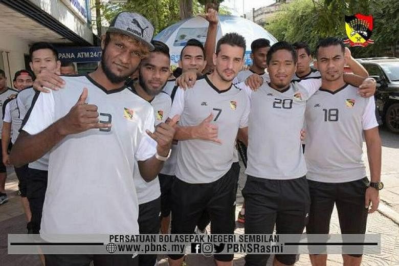 Madhu Mohana (in cap) with Negeri team-mates while on a training tour in pre-season. He says the club cited a "long-term" groin injury for ending his contract.