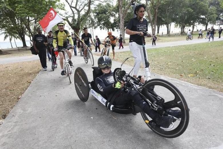 Dr William Tan handcycled for 31 hours from East Coast Park to Serangoon Junior College to mark the 31st anniversary and raise funds for Bizlink Centre, a charity that serves people with disabilities.