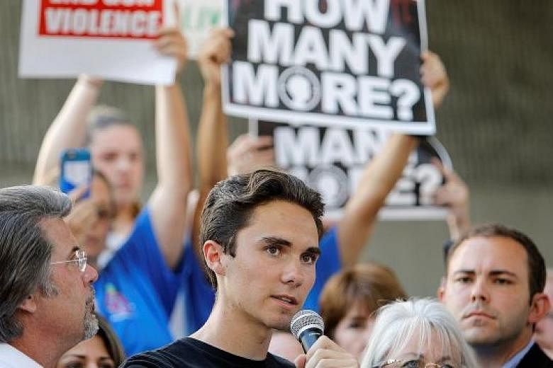 Student David Hogg speaking at a rally calling for more gun control on Feb 17, three days after the shooting at his school in Florida. The President's son Donald Trump Jr liked a pair of tweets that accused the teenager of criticising the Trump admin