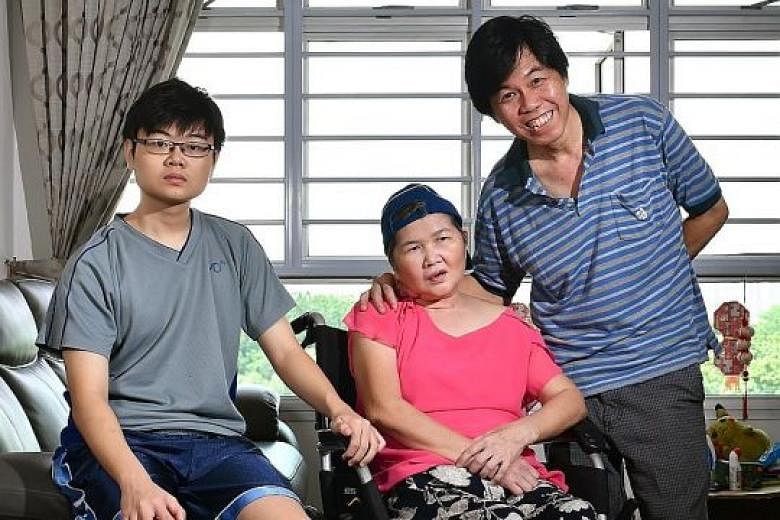 DECEMBER 2016: The family was overjoyed when Madam Ang was well enough to be discharged from hospital. She is seen here with her son Dominic and husband Leong Loon Wah. 