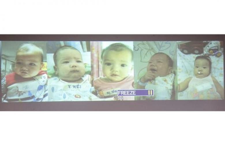 Five of the babies whom Thai police said could have been fathered by him.