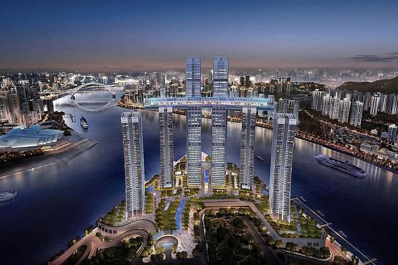An artist's impression of Raffles City Chongqing. Opening in phases next year, the 24 billion yuan (S$5 billion) complex by CapitaLand and Ascendas-Singbridge comprises eight towers. It has the world's highest sky bridge - named The Conservatory - li