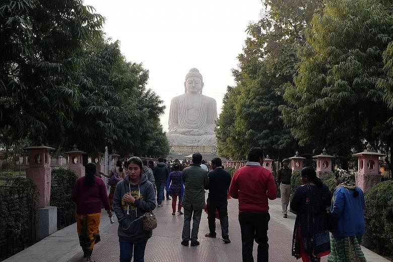 The temples in India's Bodh Gaya attract many South-east Asian tourists. Singapore has 240 flight services a week to India.