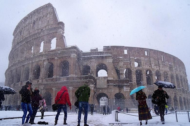 Rome woke to its first snowfall in six years yesterday as chilling winds from Siberia swept across Europe, bringing freezing temperatures that have claimed at least four lives, closed schools and disrupted travel. The "Beast from the East", as the ph