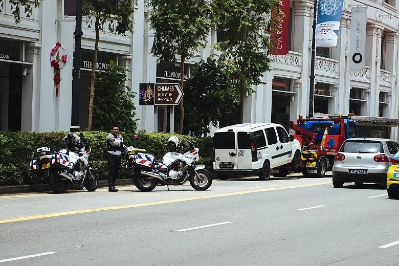 The man's van, parked near Capitol Piazza yesterday, was towed away at around 12.30pm. Suspected drug-related paraphernalia were seized from the vehicle.