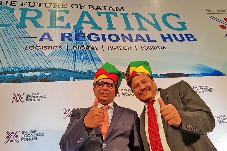 Indonesia Economic Forum founder Shoeb Kagda (left) and Mr Lukita Dinarsyah Tuwo, chairman of the Batam Indonesia Free Zone Authority, at the Batam Economic Forum on the island yesterday.