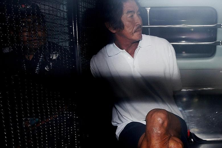 Chew Eng Han (left) and Tan Poh Teck were nabbed at sea on Feb 21. Chew is accused of leaving Singapore unlawfully at Pulau Ubin Jetty - which is not an authorised place of embarkation, departing place or point of departure - by boarding Tan's motori