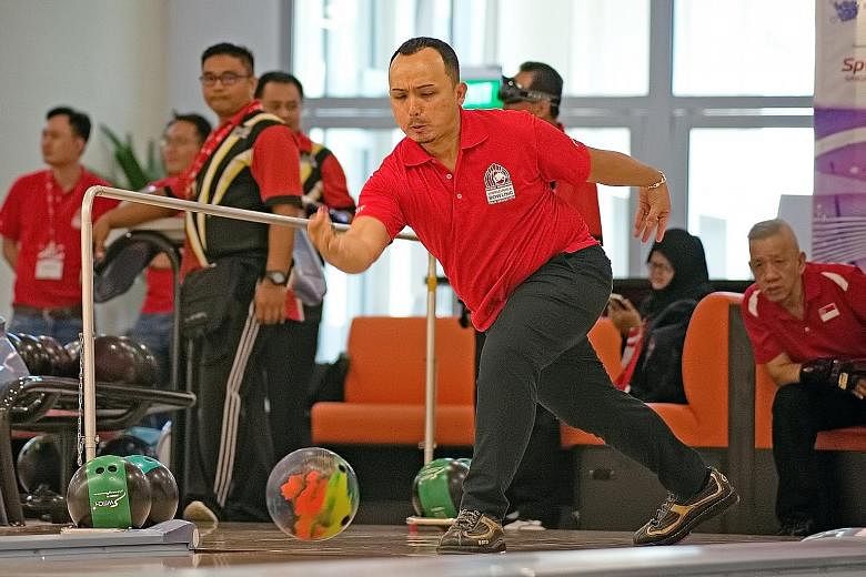 Ismail Hussain won two gold medals at the first leg of the inaugural World Para Bowling Tour Series in Singapore.