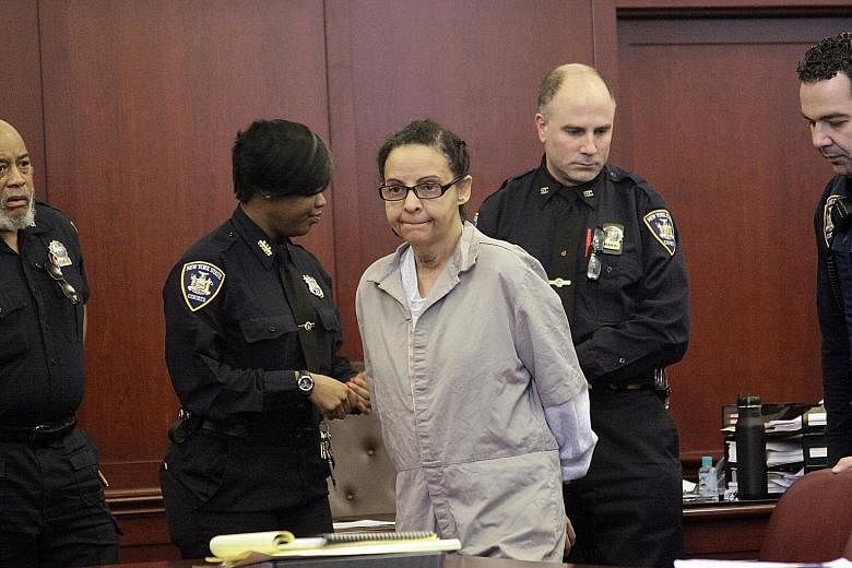 A New York court saw scenes of anguish when a mother tearfully confronted the nanny who stabbed to death two of her young children in a bloody frenzy nearly six years ago. Yoselyn Ortega (left) was in the dock on Thursday for the killings of Lucia, s