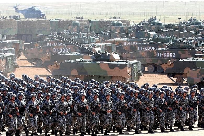 A military parade marking the 90th anniversary of the founding of the People's Liberation Army last July. Some defence experts say China is eroding the US' military technology dominance and that the PLA could surpass the US military in AI capabilitie