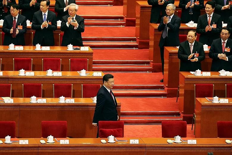 President Xi Jinping at a National People's Congress session in Beijing last March. The CCP central committee has proposed abolishing the term limits in the Constitution, which will pave the way for Mr Xi to stay on as president for life, but observe