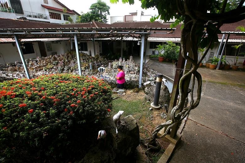Madam Hedy Mok, the niece of widow Chung Khin Chun, in the art gallery in the annex block of the Gerald Crescent property. Madam Chung's property at 2F, Gerald Crescent, sits on land about the size of half a football field, and has a 999-year lease t