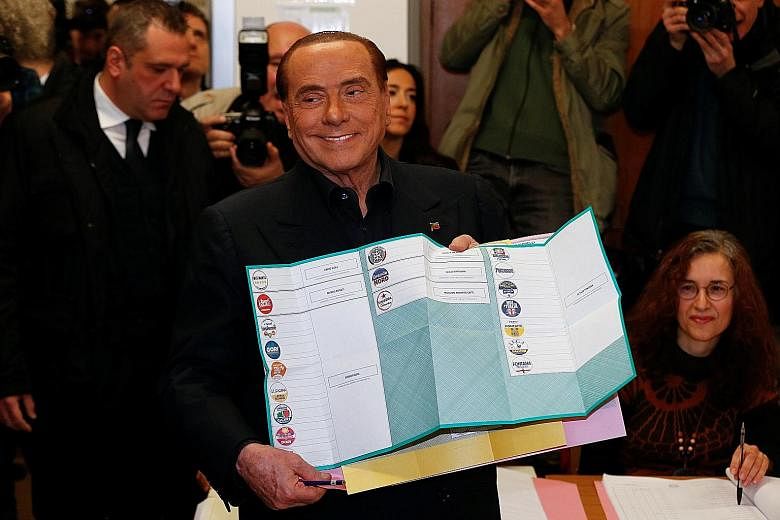 Opinion polls predict that former Italian prime minister Silvio Berlusconi's centre-right party, Forza Italia, and his far-right ally, the eurosceptic League, will emerge as the largest bloc in Parliament but will fall short of a majority.