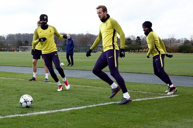 Tottenham players led by Harry Kane (second from right) and Dele Alli playing piggy in the middle at their training centre in Enfield ahead of their second leg against Juventus. Spurs hold a slender advantage over the Italian champions by virtue of t