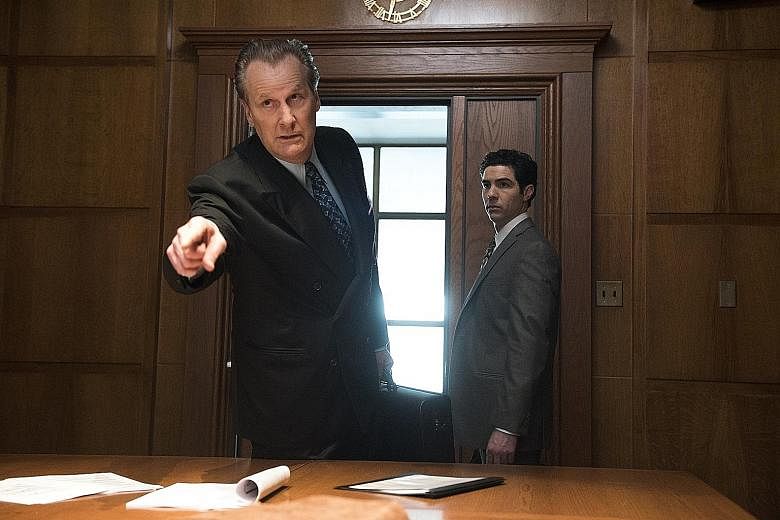 In The Looming Tower, Jeff Daniels plays FBI's magnetic but flawed counter-terrorism chief John O'Neill (far left) and Tahar Rahim plays his junior agent Ali Soufan.