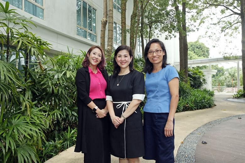 Head of Duke-NUS Medical School's Centre for Clinician-Scientist Development Koh Woon Puay (centre), who founded a year-long professional leadership training programme that aims to empower women clinician-scientists and scientists to succeed in their