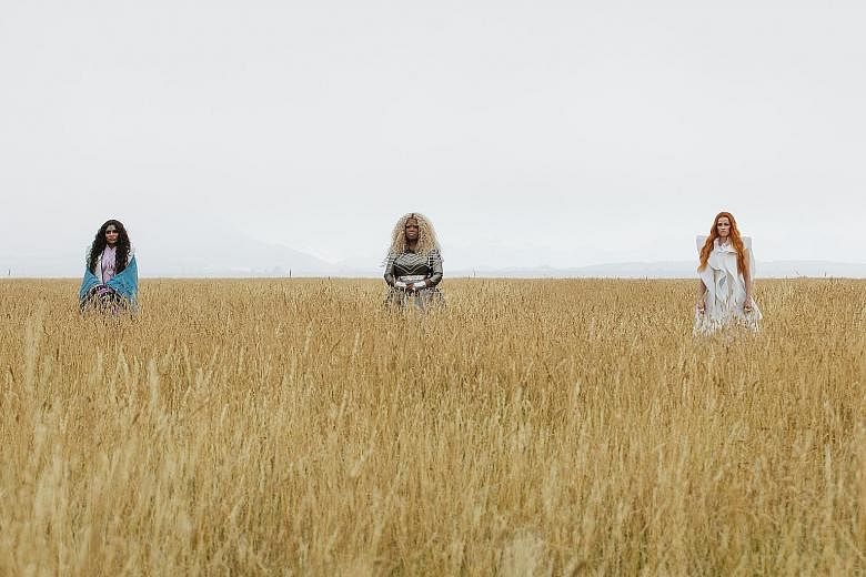(From far left) Reese Witherspoon and Storm Reid in A Wrinkle In Time, which also stars Oprah Winfrey (above) as a supernatural being embodying magical thinking.