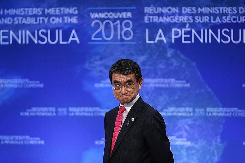 Mr Taro Kono at a foreign ministers' meeting in Vancouver in January. At yesterday's ministerial conference, he said that "substandard infrastructure will not only inhibit inclusive and sustainable development, but it could even become bottlenecks to