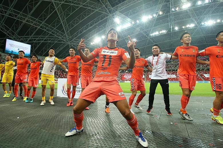 Albirex players celebrating their Community Shield title and three S-League points, after last year's 2-1 win over Tampines.