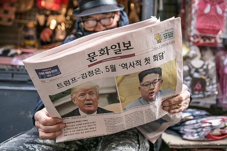 A South Korean newspaper with US President Donald Trump and North Korean leader Kim Jong Un on its front page. North Korea's diplomacy accelerated last week, punctuated by Mr Kim's meetings with South Korean envoys, and the announcement that he and M