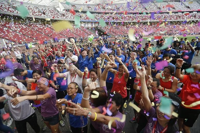 After 15 hours of taking part in a non-stop relay yesterday, runners still found the energy to take part in a mass dance workout. More than 6,500 people joined the Singapore Cancer Society-TalkMed Relay for Life which began on Saturday night at the N