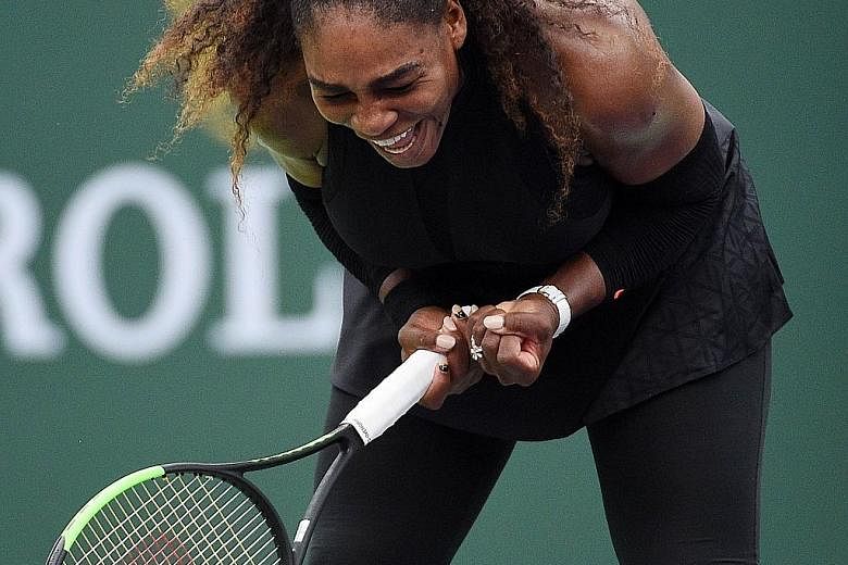 Serena Williams celebrates after her 7-6 (7-5), 7-5 victory against No. 29 seed Kiki Bertens of the Netherlands in the second round of the BNP Paribas Open at Indian Wells, California, on Saturday. Unseeded Serena leads the head-to-head against her s