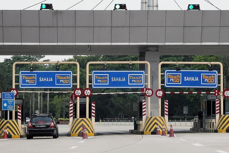 A toll booth at a road in Johor Baru.