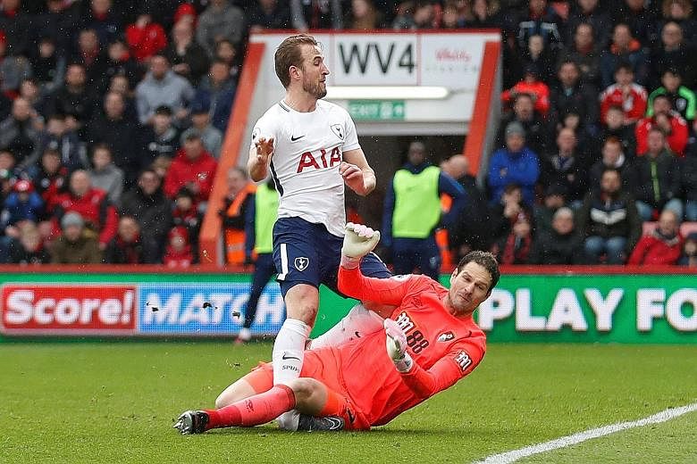Tottenham Hotspur striker Harry Kane injured his right ankle in this tangle with Bournemouth goalkeeper Asmir Begovic during the Spurs' 4-1 Premier League win on Sunday. Kane has scored 35 goals for his club this season and, if he is forced to endure