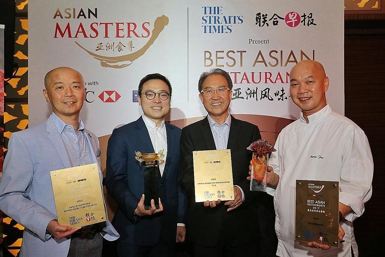 Receiving Best Asian Restaurants Awards last year were (from left) Shinji by Kanesaka's master chef Koichiro Oshino; Imperial Treasure Restaurant Group's founder Alfred Leung's son Kenny, and younger brother Vincent (collecting the award on his behal