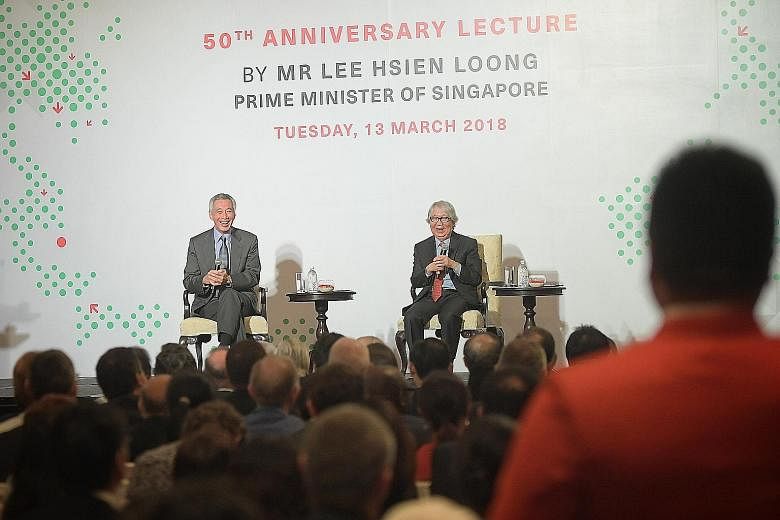 Prime Minister Lee Hsien Loong answering questions during the question-and-answer session moderated by Professor Tommy Koh at the ISEAS - Yusof Ishak Institute's 50th anniversary lecture yesterday.