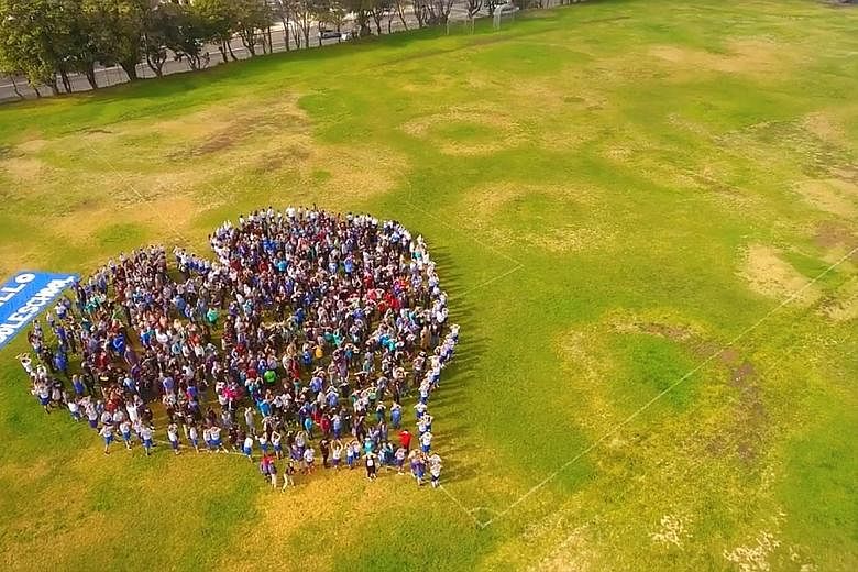 CALIFORNIAStudents form a heart-shaped display in Santa Carla on Wednesday to protest against gun crime in schools. COLORADO High school students protesting on Wednesday to mark the shooting at Marjory Stoneman Douglas High School in Parkland, Florid