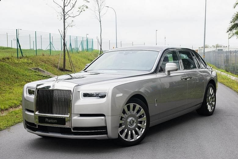 The Rolls-Royce Phantom comes with a glass-encased display (above) where owners can mount artefacts. The luxurious Rolls-Royce Phantom glides around corners with the ease of a car half its size.
