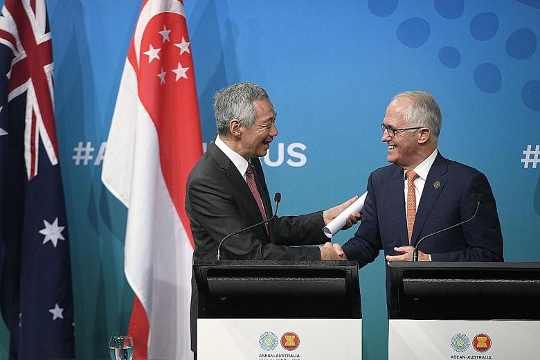 Prime Minister Lee Hsien Loong and Australian Prime Minister Malcolm Turnbull at a joint press conference at the Singapore-Australia Leaders' Summit yesterday.