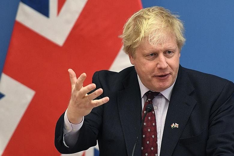 British Foreign Secretary Boris Johnson (left) said on Friday it was overwhelmingly likely that Russian President Vladimir Putin (right) himself had made the decision to use a military-grade nerve toxin to strike down former Russian spy Sergei Skripa
