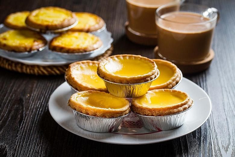 Tai Cheong Bakery, famed for its egg tarts, is one of the brand-name Hong Kong eateries here.
