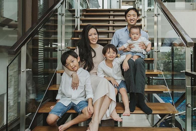 Entrepreneur Elaine Kim with her husband John, and sons (from far left) Kyan, six, Luke, five, and Nate, one. Dr Kim believes that greater business networking support for women, and flexible work schemes can help women get ahead in their careers.