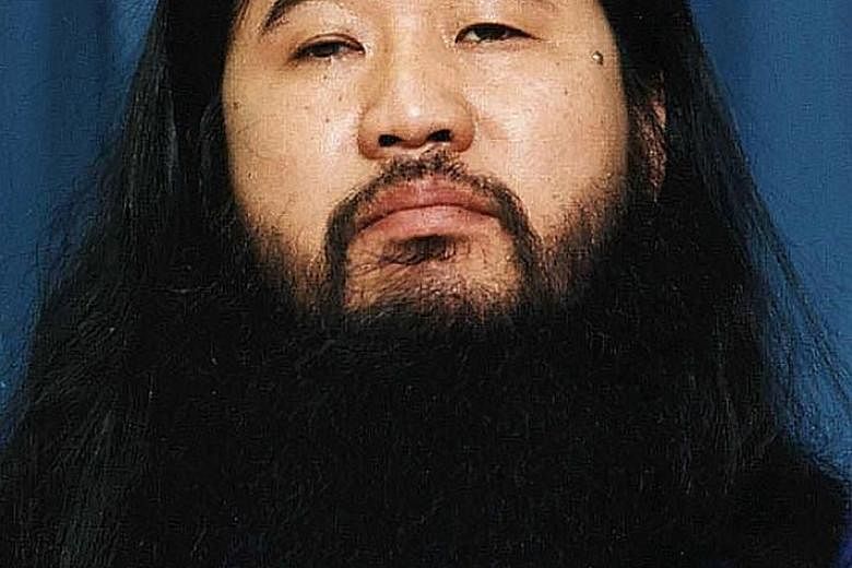 A file photo taken in October 1990 of doomsday cult guru Shoko Asahara.
