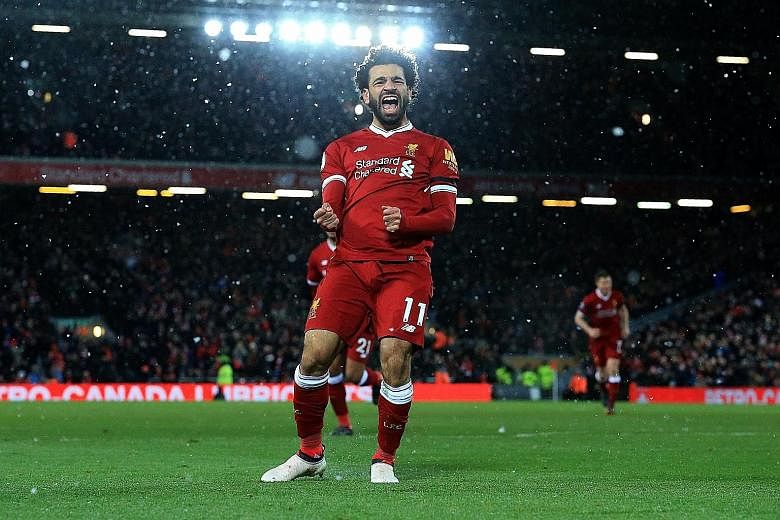 Mohamed Salah is ecstatic after his fourth goal against Watford moved him four clear of Harry Kane in the race for the Premier League's Golden Boot. The Egyptian, who has 28 in the league this season, also set up Roberto Firmino for Liverpool's third