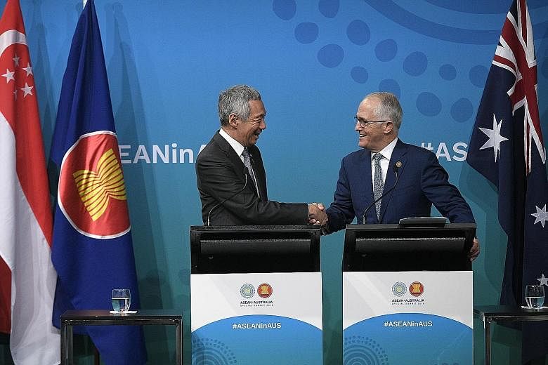Prime Minister Lee Hsien Loong and Australian Prime Minister Malcolm Turnbull at a joint press conference at the close of the Asean-Australia Special Summit in Sydney yesterday.