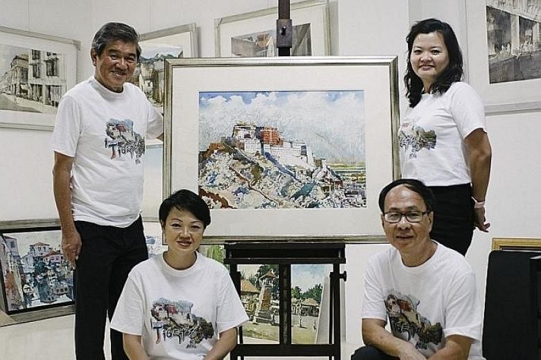 Artist Ong Kim Seng (left, standing) with his students, (anti-clockwise from front left) graphic designer and art teacher Alicia Tan, 45; semi-retired builder Tham Kum Yuen, 64; and Annie Lee, 44, who works in the construction industry.