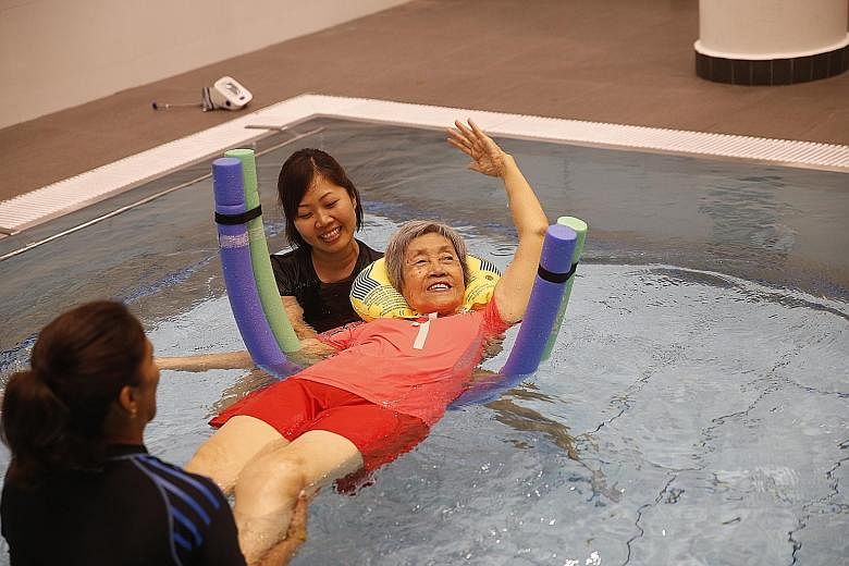 Madam Theresa Lam, who is one of five residents receiving water therapy at St Joseph's Home, feels that it has been beneficial and she can now turn around in bed.