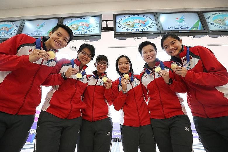 From left: 2014 Asian Games women's team gold medallists Shayna Ng, Cherie Tan, Joey Yeo, Jazreel Tan, New Hui Fen and Daphne Tan have been included in a nine-member training squad for this August's competition in Indonesia.