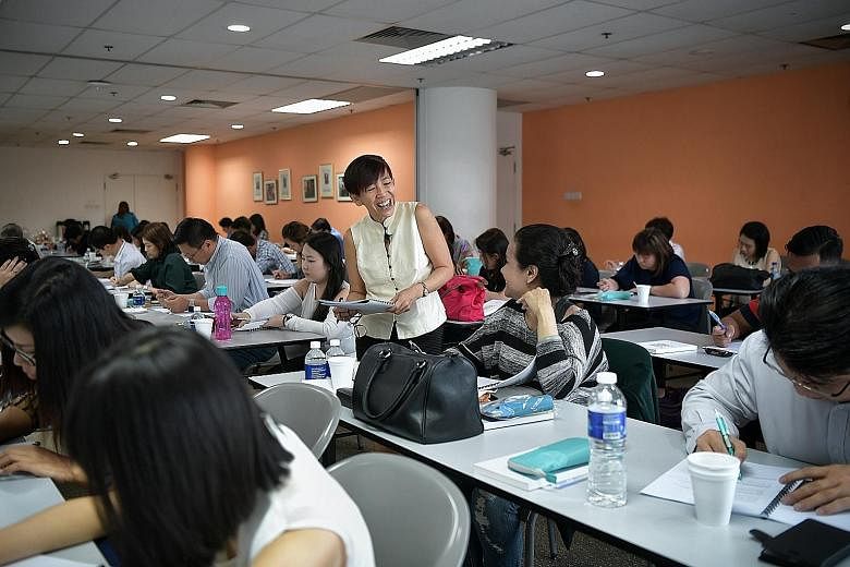 Straits Times journalist Angelina Choy conducting the ST English Masterclass last Friday. Those who have SkillsFuture Credit can now use it to offset the course fee of $499 when they sign up for the masterclass.