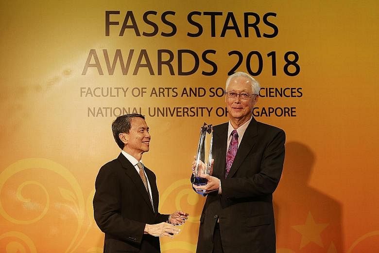 Emeritus Senior Minister Goh Chok Tong with NUS chairman Hsieh Fu Hua at the award ceremony at the One Farrer Hotel and Spa last night. Mr Goh received the Distinguished Arts and Social Sciences Alumni Award (Lifetime Achievement) at the event.